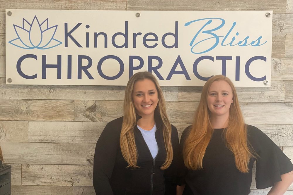 Dr. Bre and Dr. Buck at Kindred Bliss Chiropractic in Summerville, South Carolina